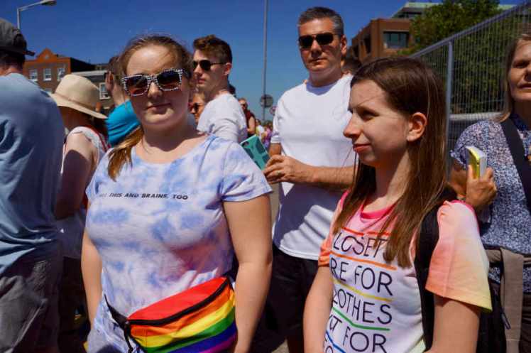 Zoe has a rainbow fanny pack.